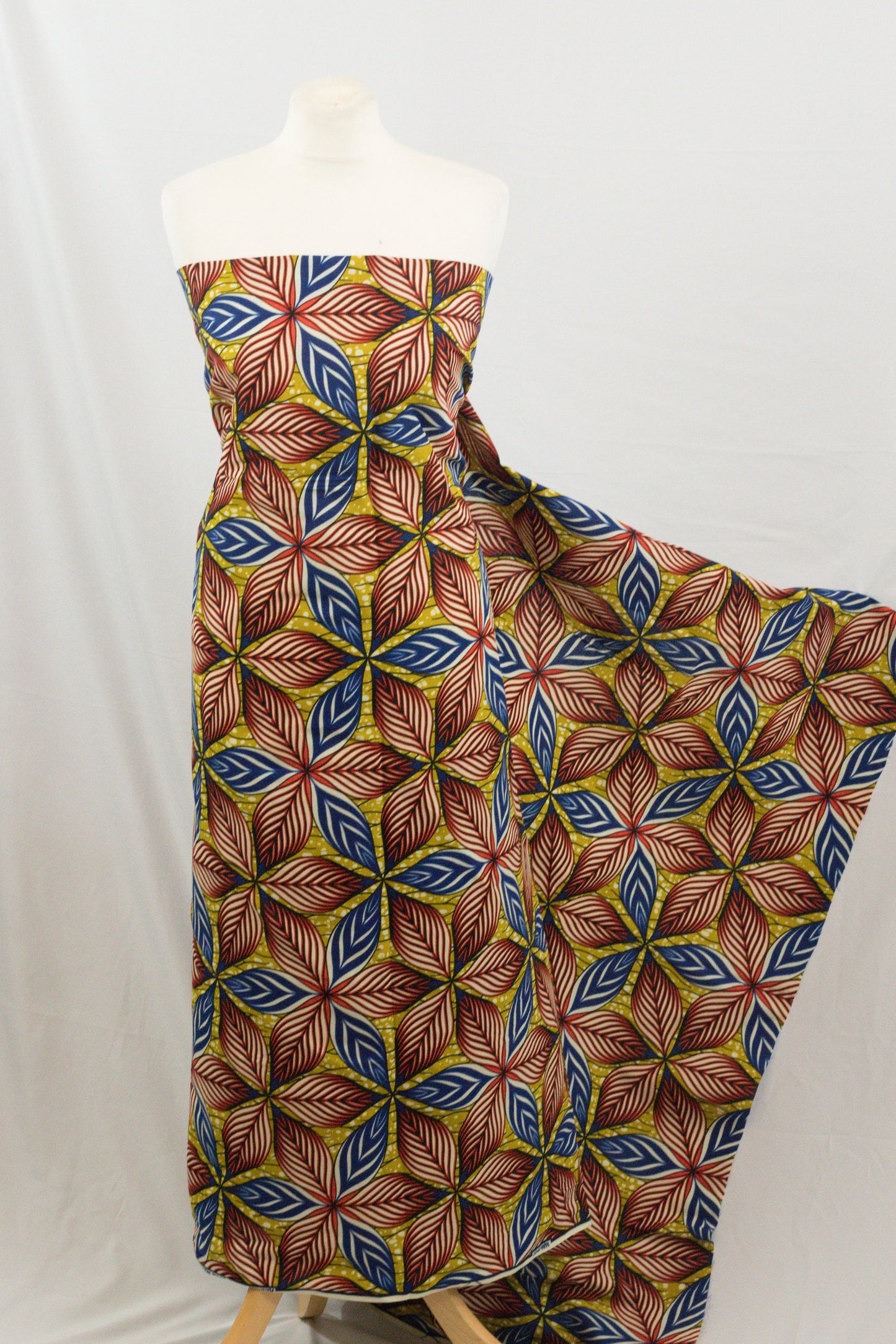 Multi coloured large leaves african ankara wax printed (100% cotton) fabric sold by the yard