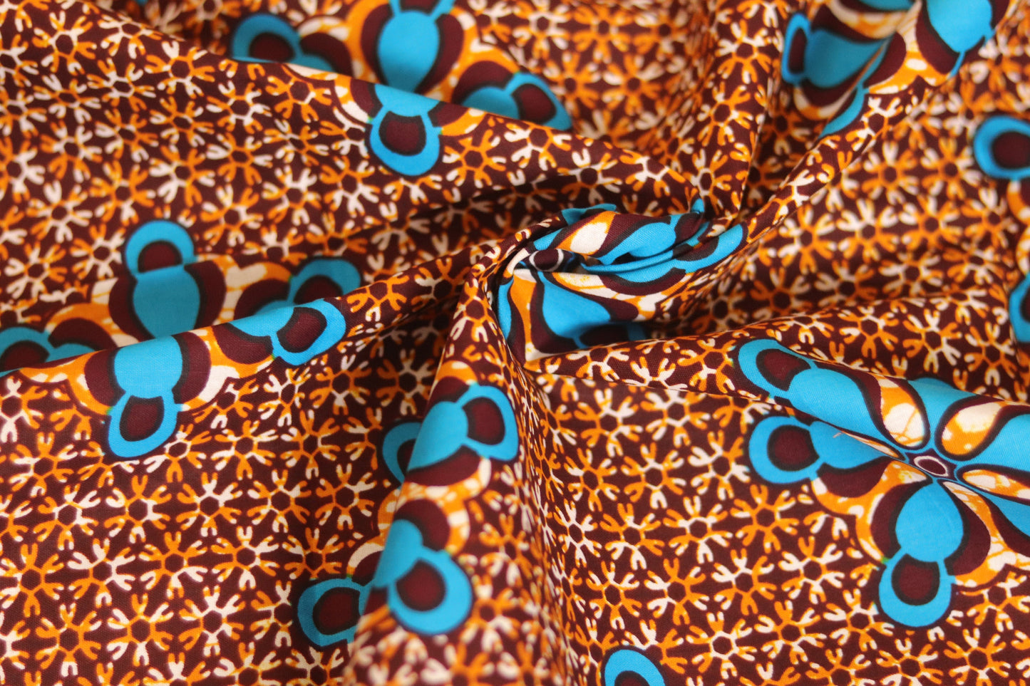 Multi coloured african ankara wax printed fabric in 100% cotton sold by the yard